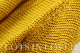 秋日暖意，經(jīng)典重生——品味大翻領(lǐng)粗棒針羊毛衫的溫暖時尚